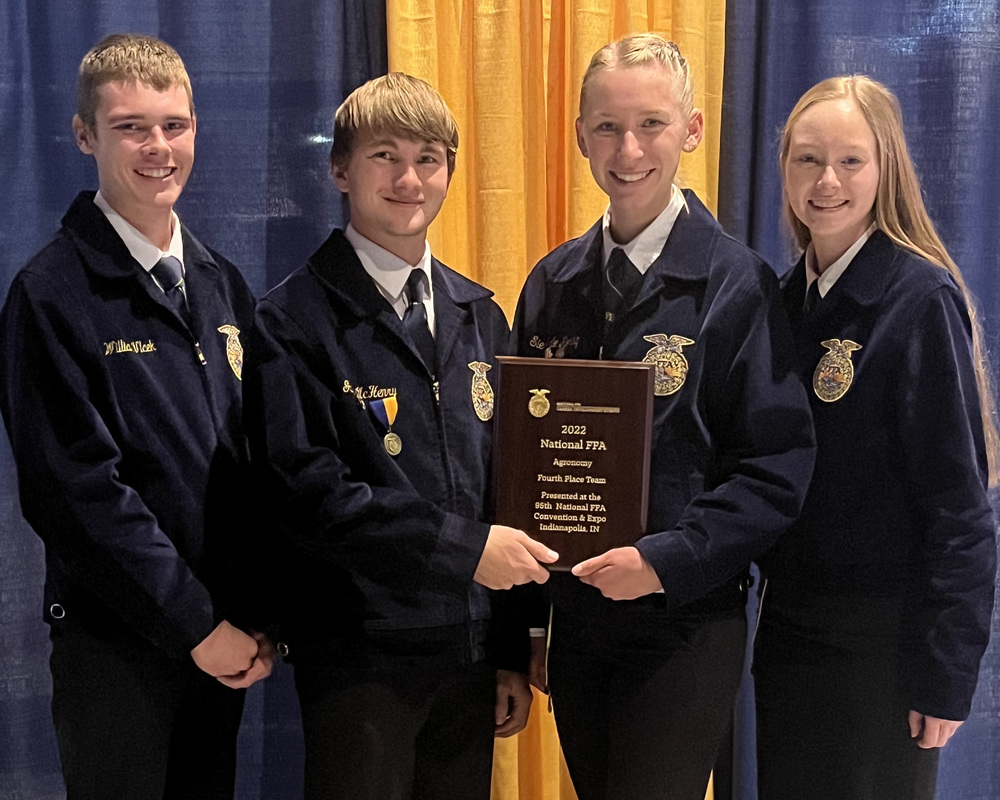 FFA students with an award
